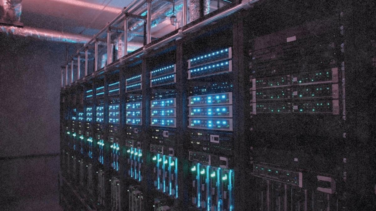 Server rack with blue LED lighting in data center environment