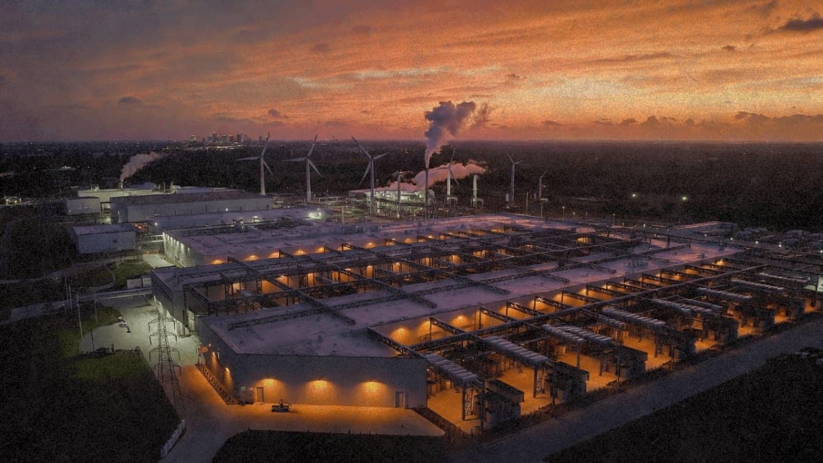 Aerial view of xAI Colossus 2 data center facility in Memphis with natural gas turbines and power infrastructure at dusk
