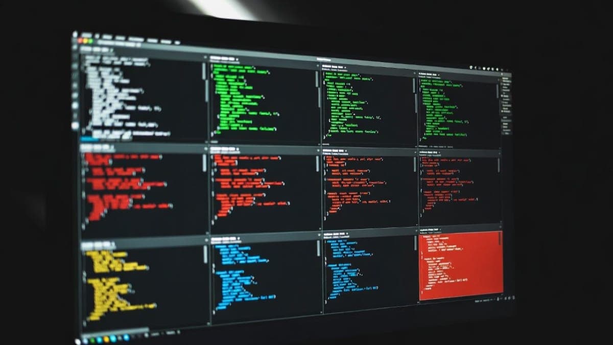 Grid of terminal windows showing multiple AI agents running parallel experiments on a dark screen