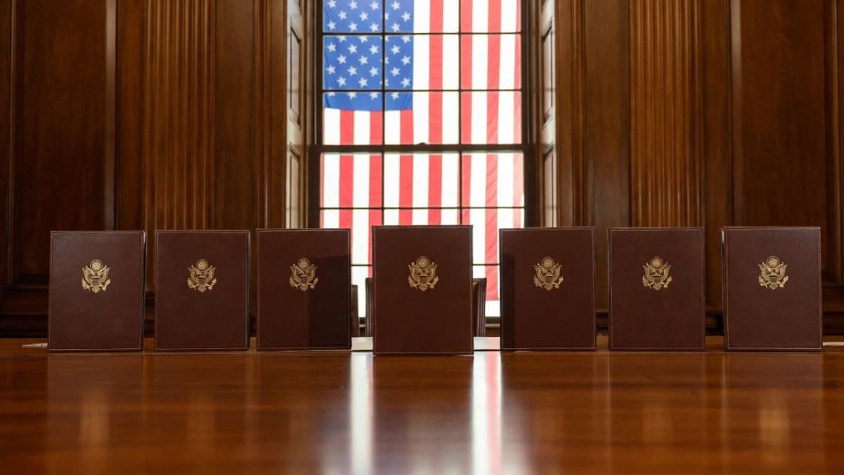 Tech executives seated around a conference table at the White House signing ceremony for the Ratepayer Protection Pledge