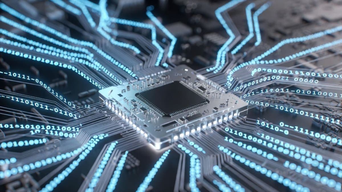 A laptop processor chip surrounded by flowing binary data streams of zeros and ones, rendered in cool blue tones