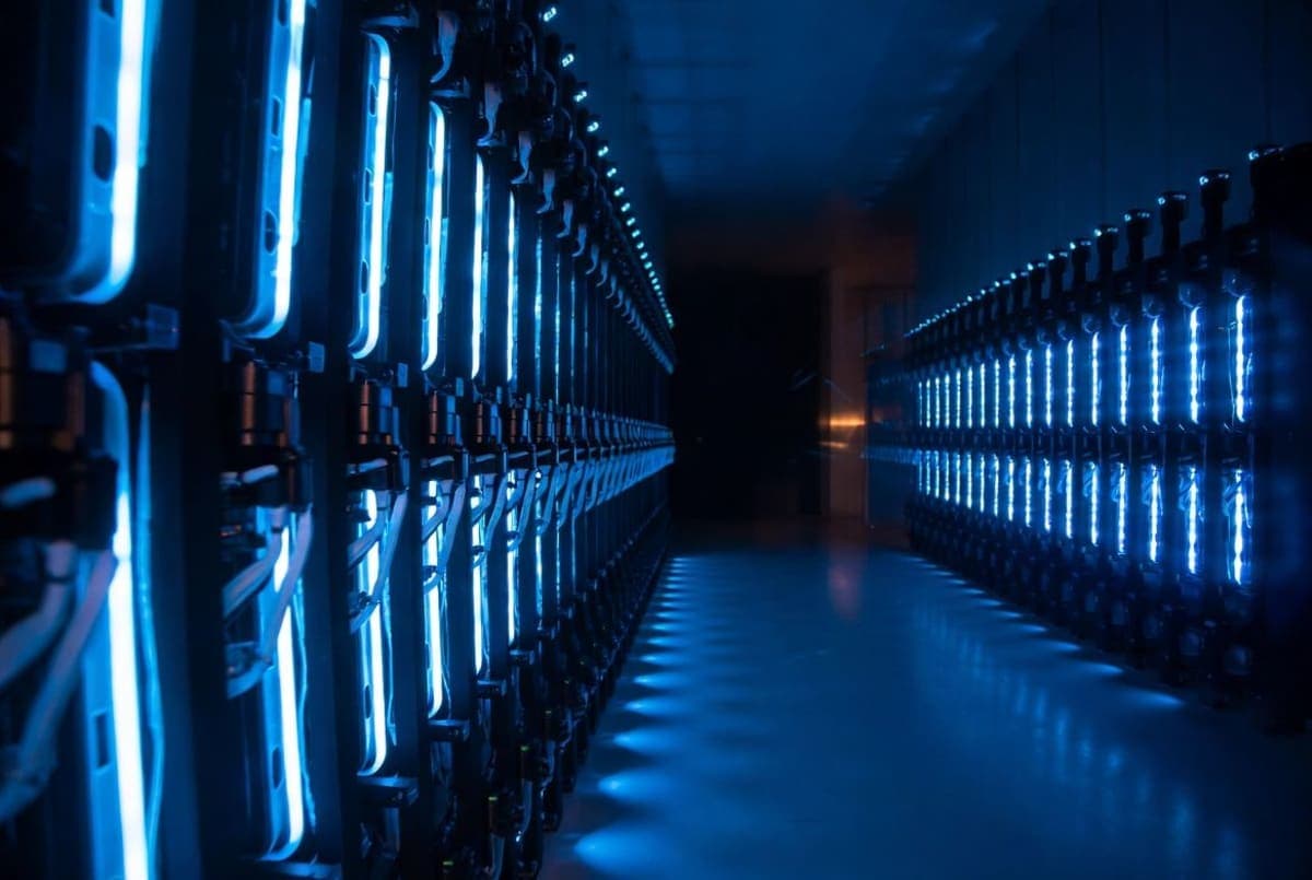 European Union flag overlaid on a stylized data center server room with blue lighting