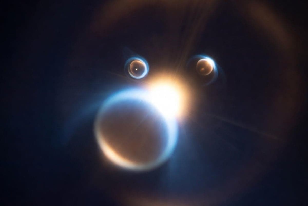 Abstract representation of three tiered AI models orbiting a central glowing core, suggesting capability levels